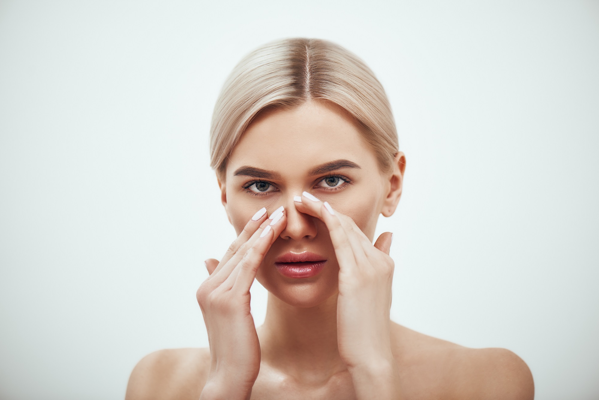 BDD sufferers compulsively check a body part, often a facial feature, ask for reassurance, conceal it, and seek out multiple cosmetic plastic surgeries.
